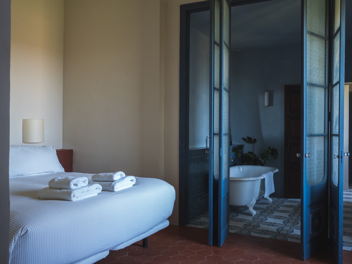 Blue Room freestanding bath with azure tiles
