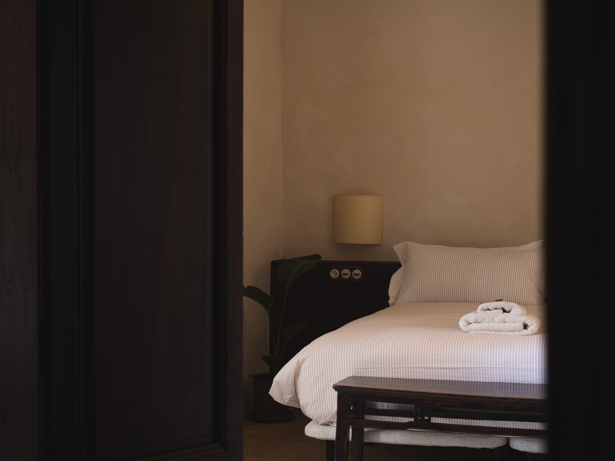 The Terrace Suite bedroom with linen bedding