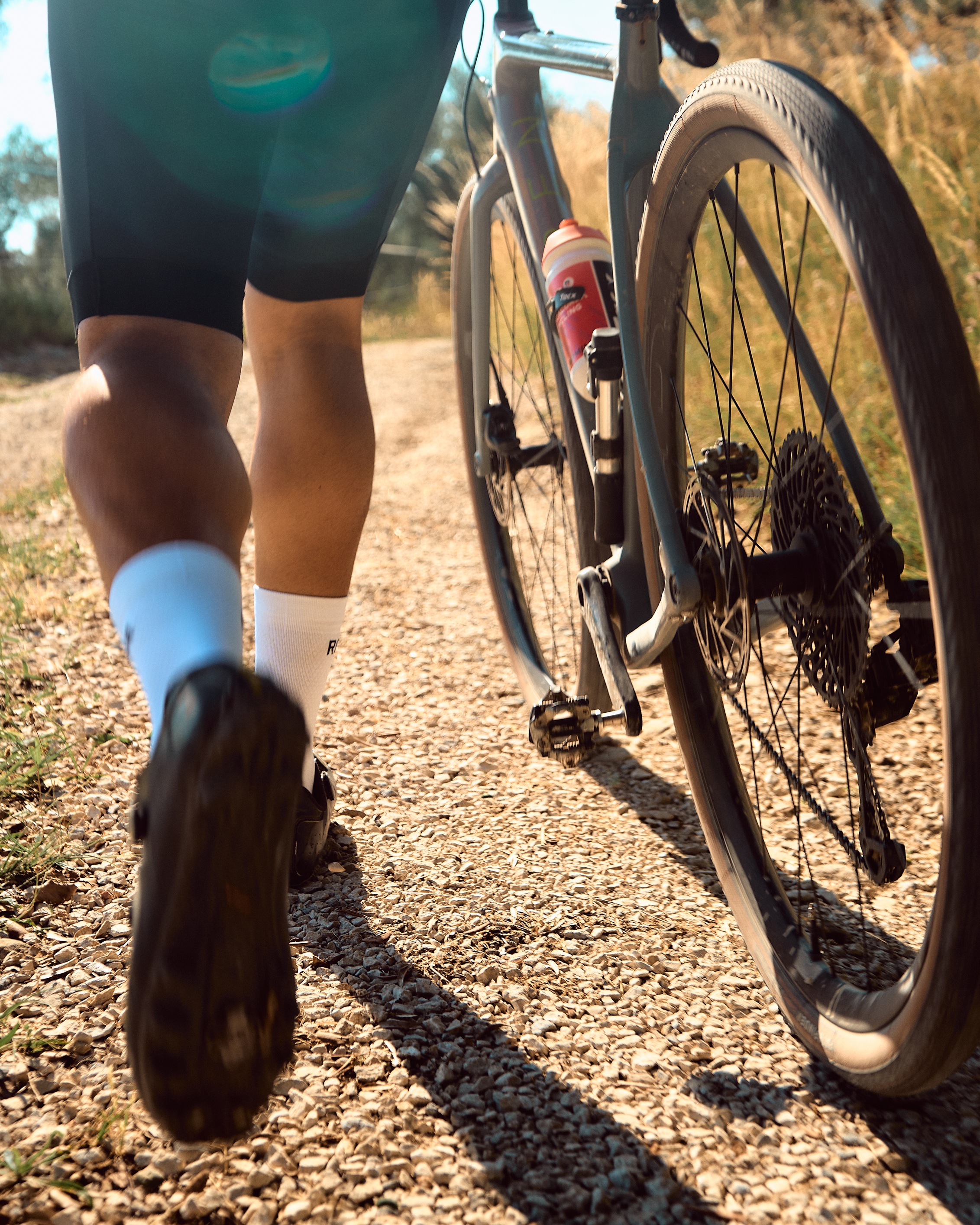 Cyclists on a gravel trail near Banyoles